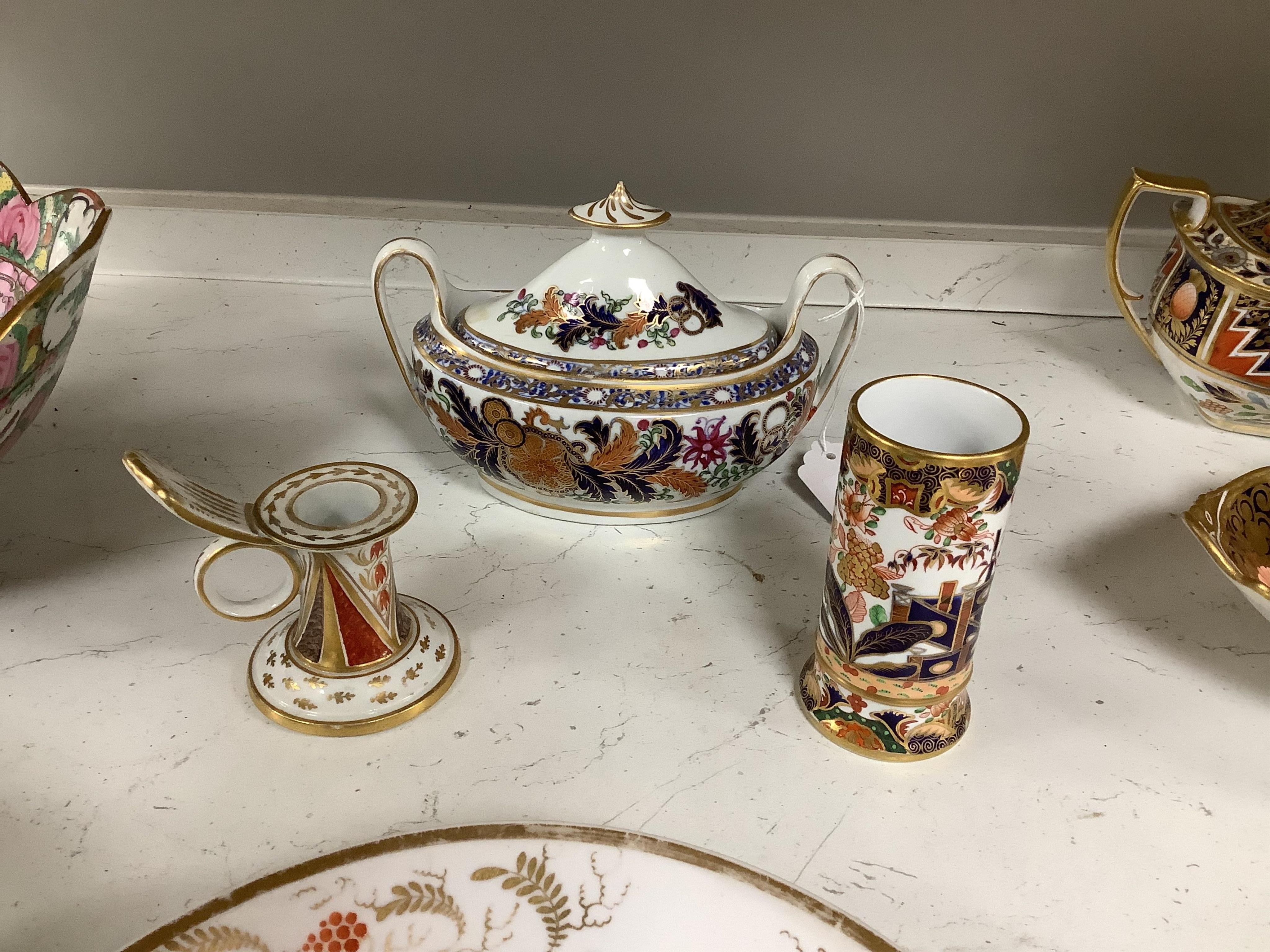 Sixteen mixed items of 1800-1820 English porcelain tableware, to include: three sucriers and covers, an oval ornately decorated dish, four saucer dishes, a candle holder, three spill vases and four saucers